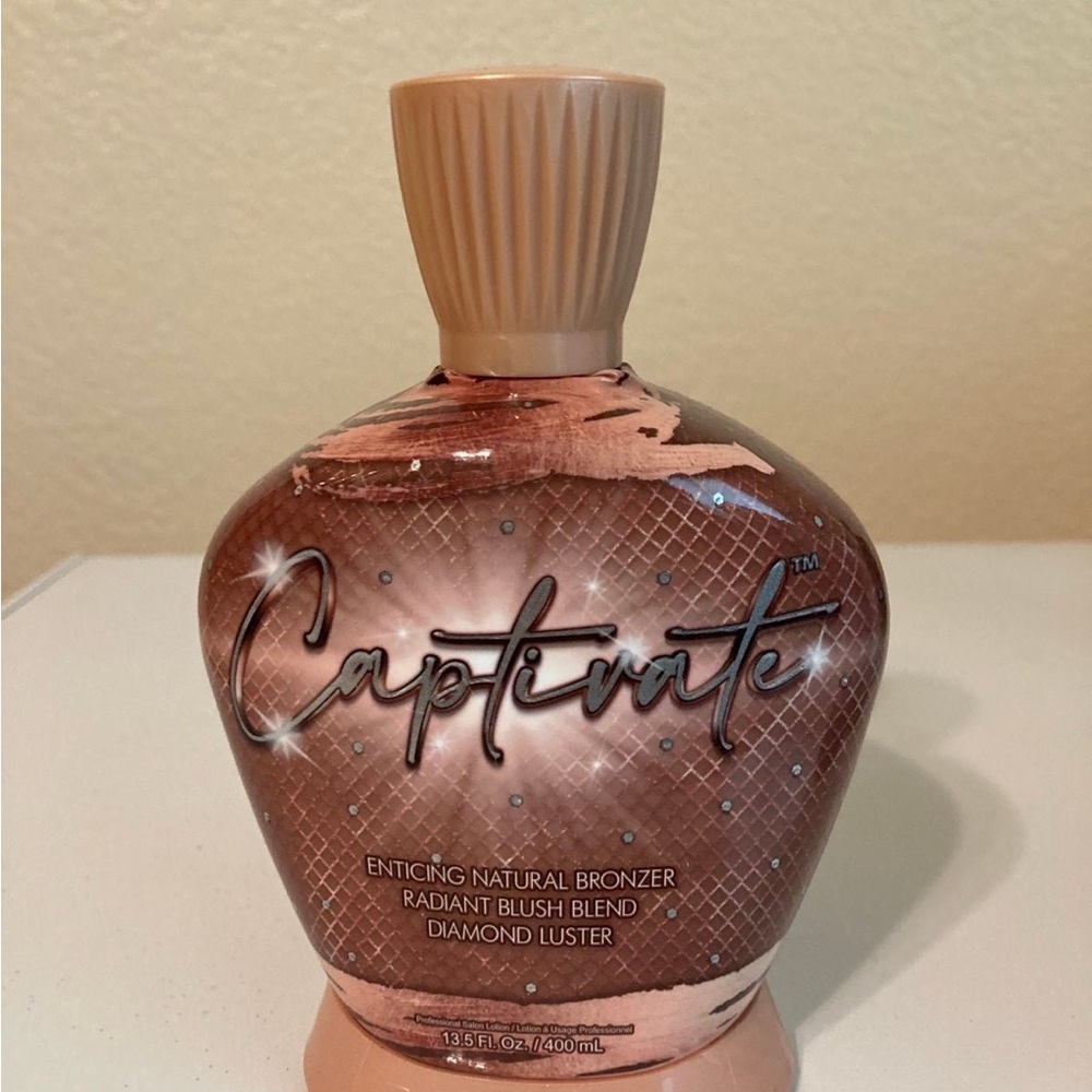 Brand New Bottle of Designer Skin Captivate Tanning Lotion
